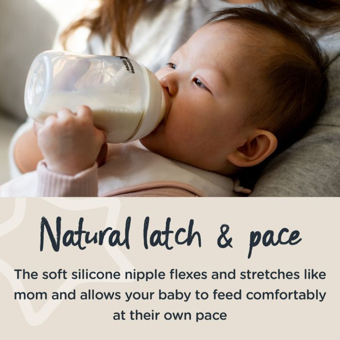 Baby drinking from Closer to Nature bottle with text about a natural latch and pace